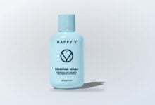 Happy V Feminine Wash bottle on a clean product background