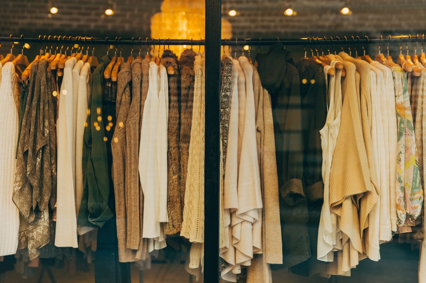 Curated women’s clothing rail in a fashion boutique