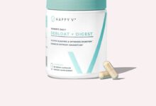 Happy V Debloat + Digest supplement bottle on a gray background