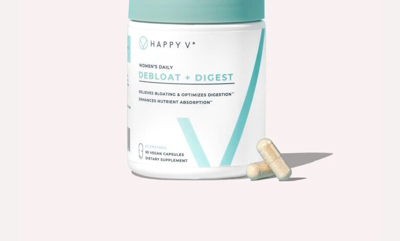 Happy V Debloat + Digest supplement bottle on a gray background
