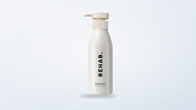 REHAB Your Hair Shampoo Milk bottle on a white background