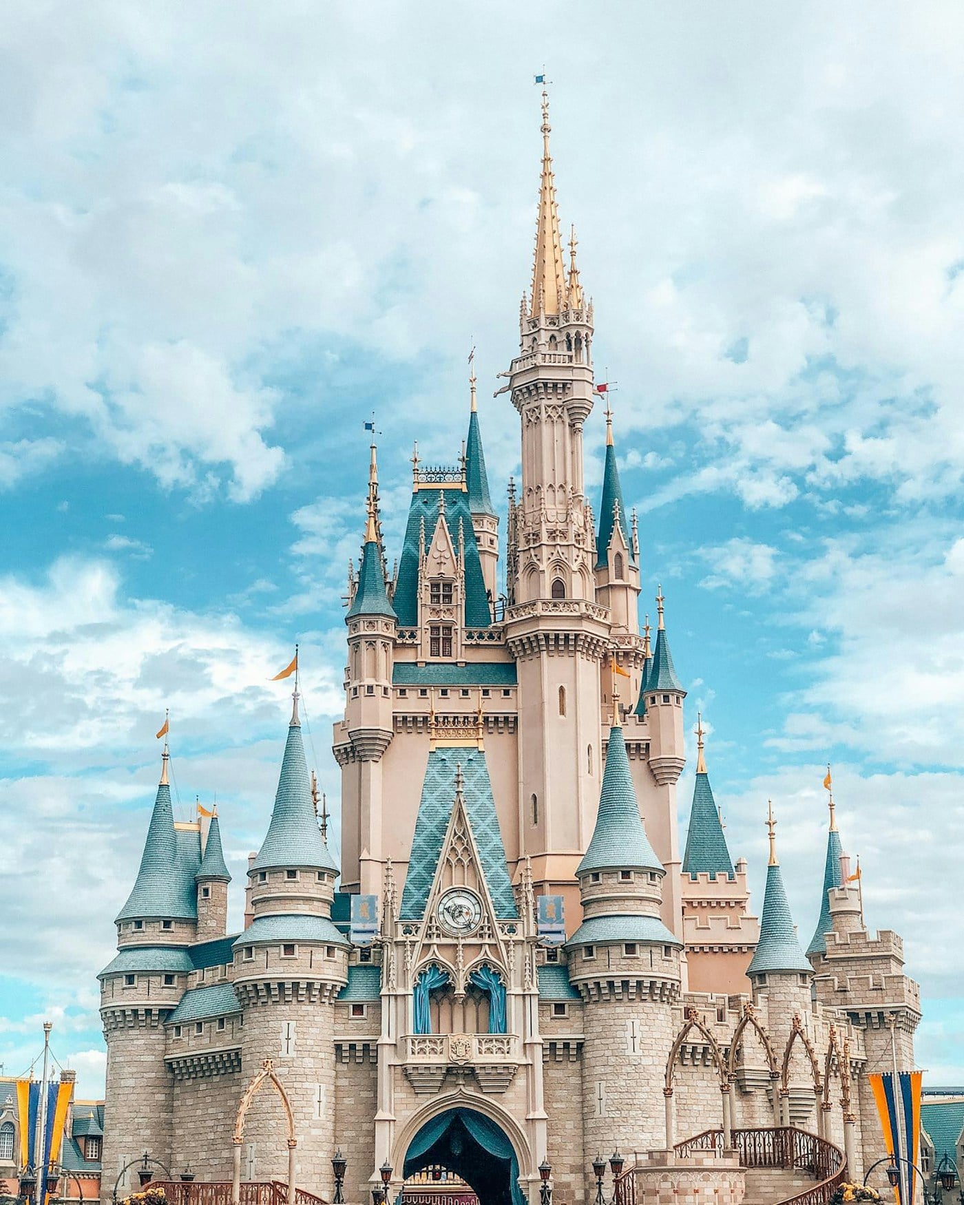 Fairytale castle at a theme park under a blue sky