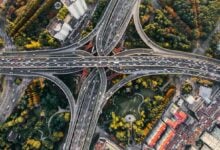 Aerial view of a highway interchange during a journey