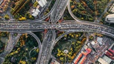 Aerial view of a highway interchange during a journey