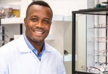 Feel Good Contacts optician beside a glasses display