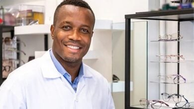 Feel Good Contacts optician beside a glasses display
