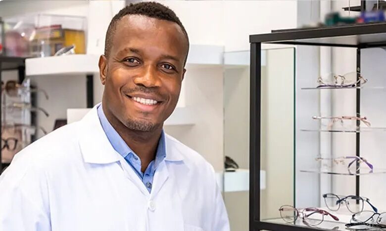 Feel Good Contacts optician beside a glasses display