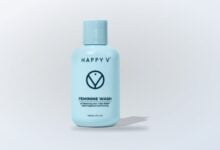 Happy V Feminine Wash bottle on a neutral background