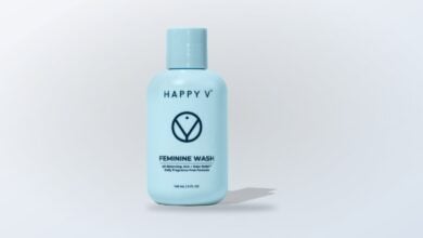 Happy V Feminine Wash bottle on a neutral background