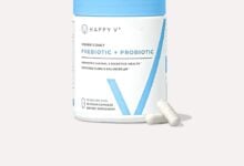 Happy V Prebiotic + Probiotic bottle with capsules on a pale gray background