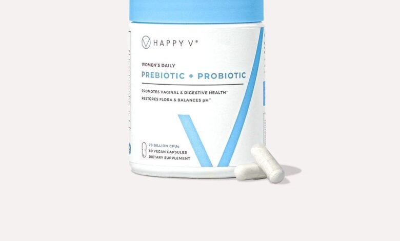 Happy V Prebiotic + Probiotic bottle with capsules on a pale gray background
