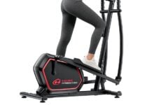 Woman using an elliptical machine